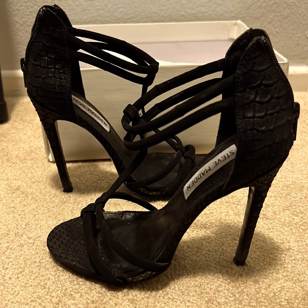 Strapped black heels